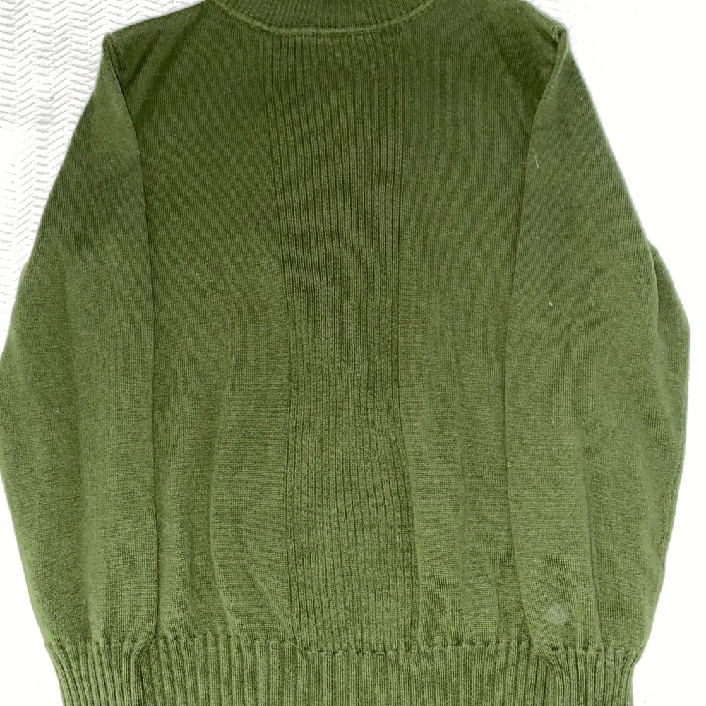 green ribbed turtleneck sweater